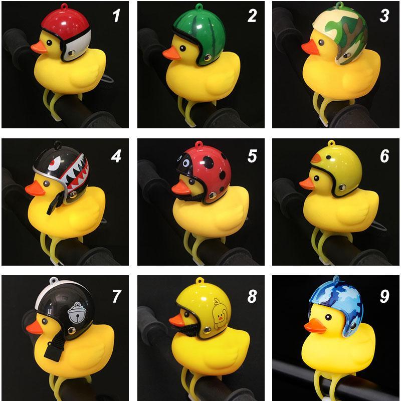 Adorable duck bike bell with helmet & LED light for kids' bikes, promoting cycle safety & outdoor fun