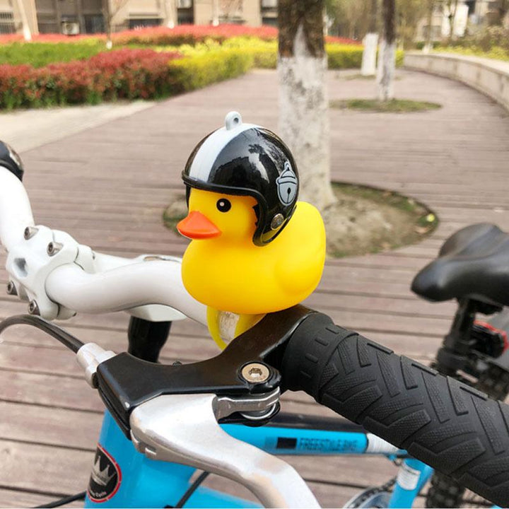 Fun yellow rubber duck bike bell featuring a propeller helmet and bright LED light for bicycles
