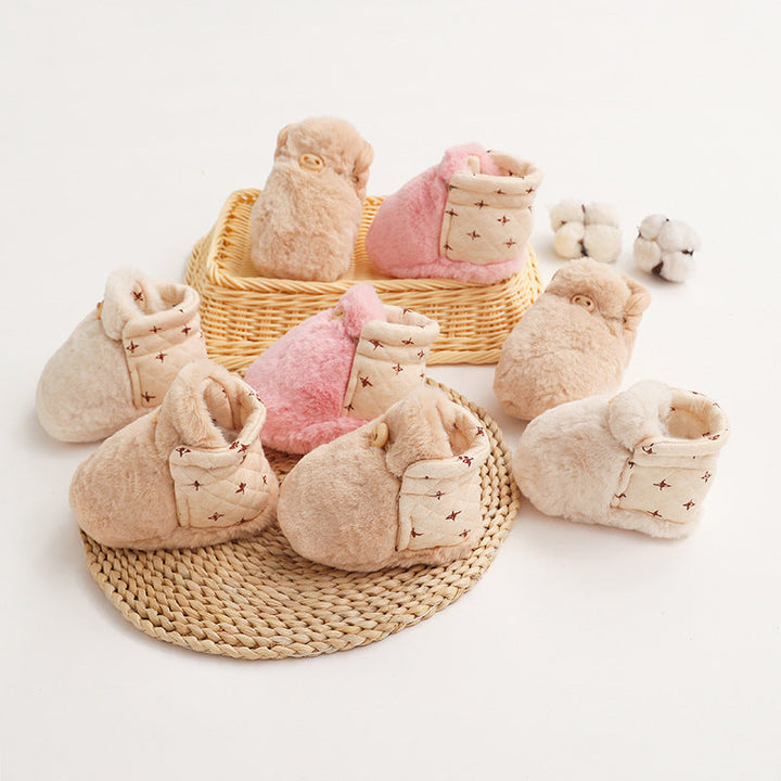 Cozy and warm plush cotton toddler shoes in a gender-neutral green frog design, anti-slip