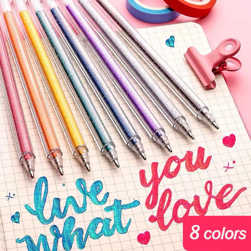 Collection of glitter gel pens in various colors, perfect for adult coloring books and art projects