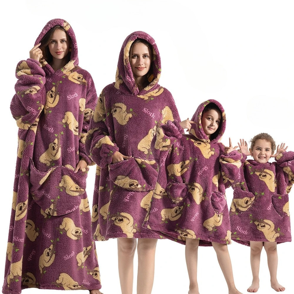 Adults' pumpkin hoodie blanket for cozy Halloween fun & festive autumn comfort.