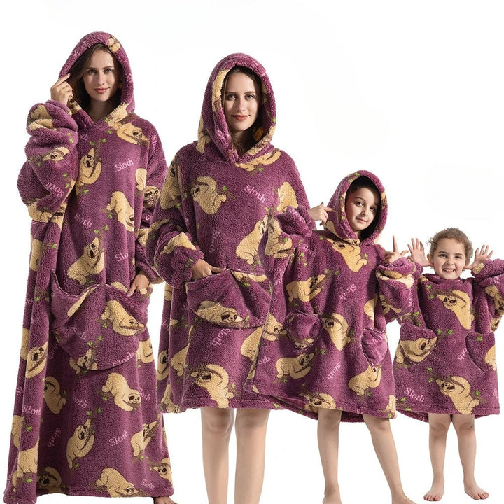 Adults' pumpkin hoodie blanket for cozy Halloween fun & festive autumn comfort.