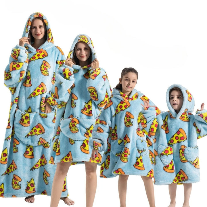 Oversized pumpkin hoodie blanket, soft unisex loungewear for ultimate cozy Halloween comfort.