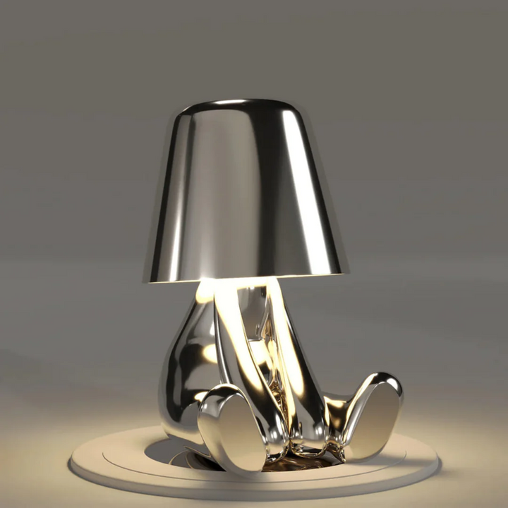 Modern artistic desk lamp, touch control dimmable LED for task or accent lighting.