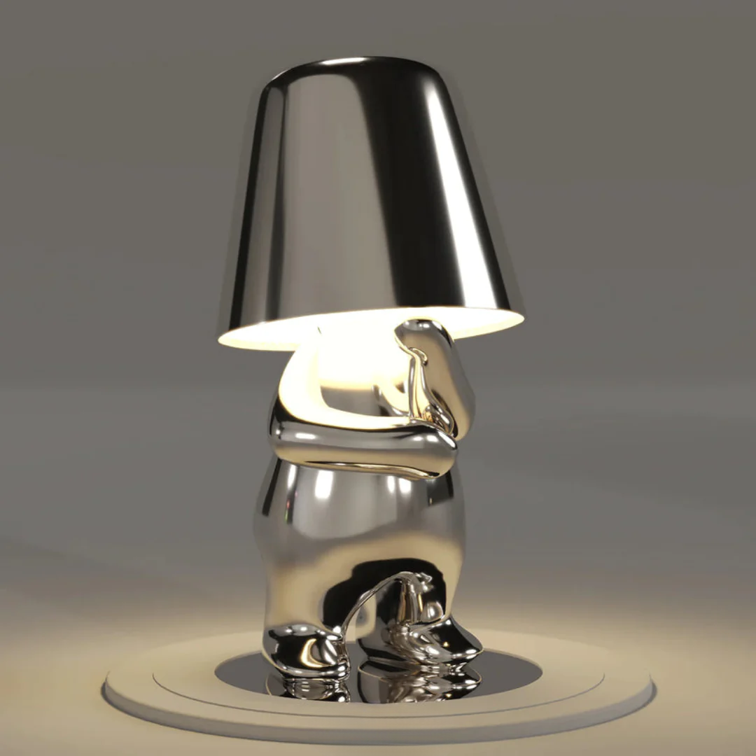 Resin artistic table lamp featuring dimmable LED and responsive touch control.