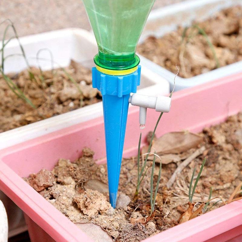 Garden helper: terracotta plant watering spikes, essential for consistent plant hydration