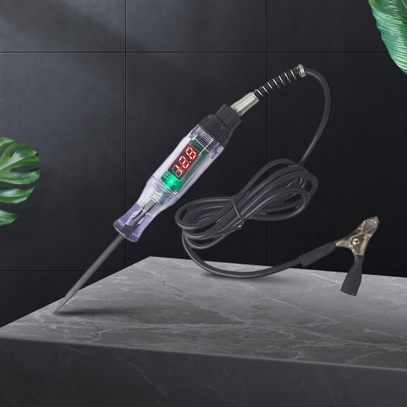 Close-up of the tip of an automotive circuit test pen on a wire, electrical diagnostic tool