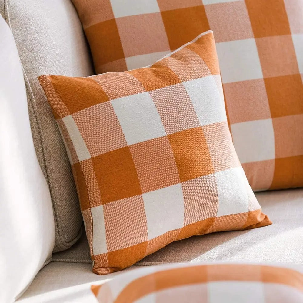 Decorative yellow checked cushion cover, perfect for country style autumn home accents.