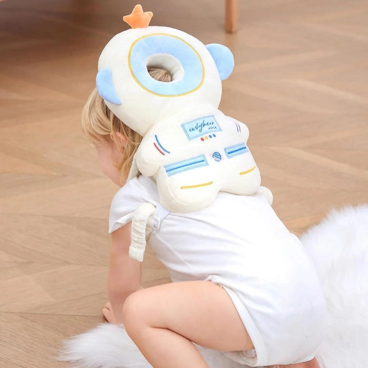 Cute baby head protector with neck cushion for toddlers learning to walk. Gentle infant safety gear.