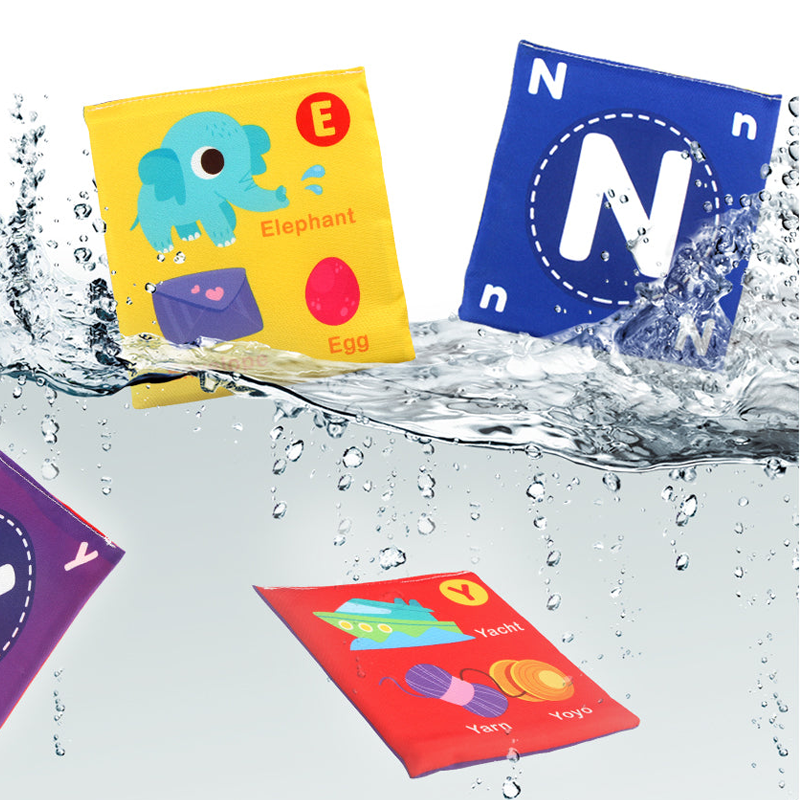 Open Baby's First Soft Cloth Learning Book showing brightly colored numbers and letters