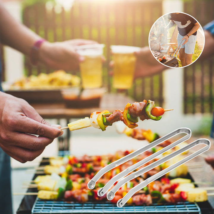Long-handled stainless steel tongs, safe distance from heat while grilling sausages