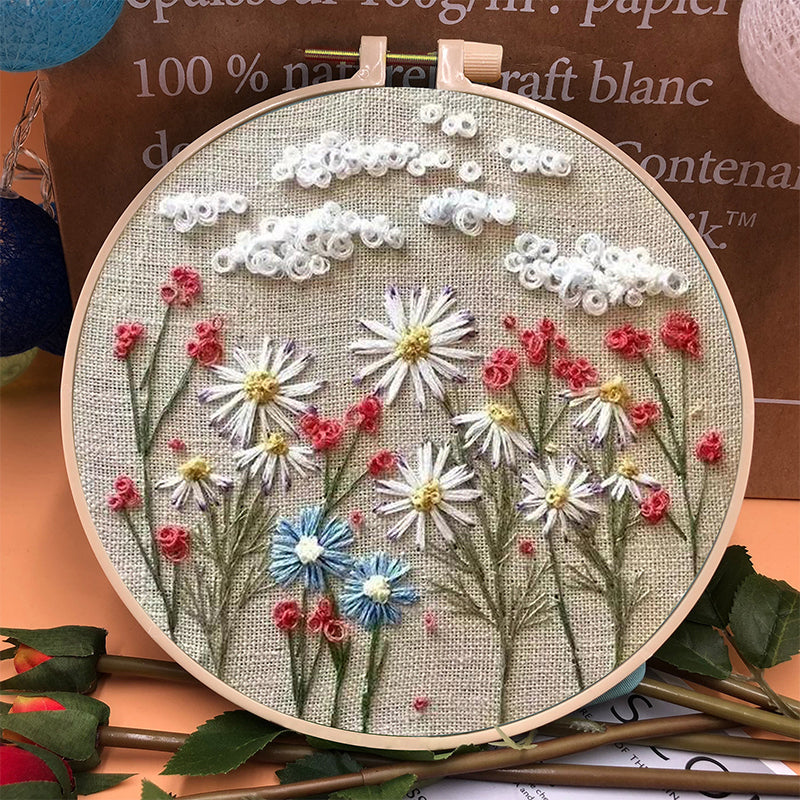 Detailed view of a beginner-friendly floral embroidery kit with colorful threads and hoop.