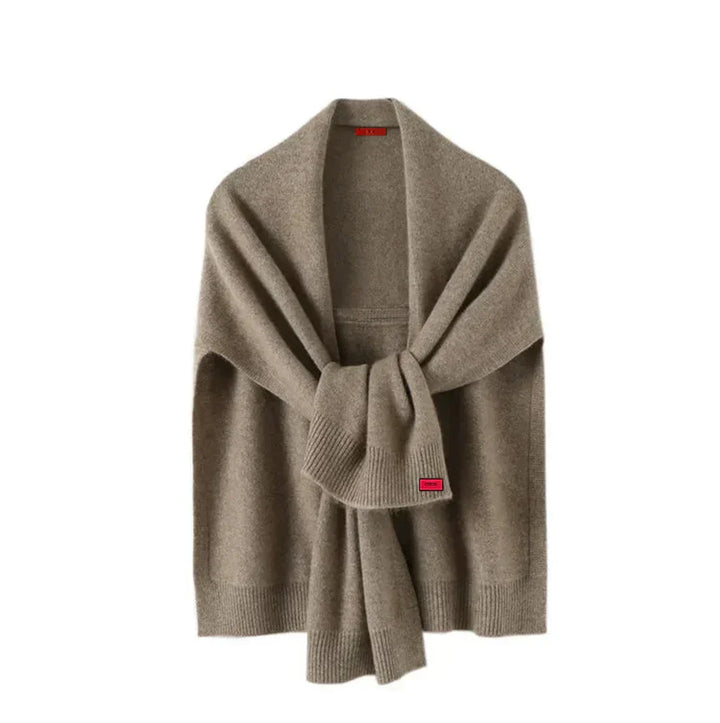 Beige women's soft knitted cape wrap, perfect for elegant autumn and winter fashion accessories.