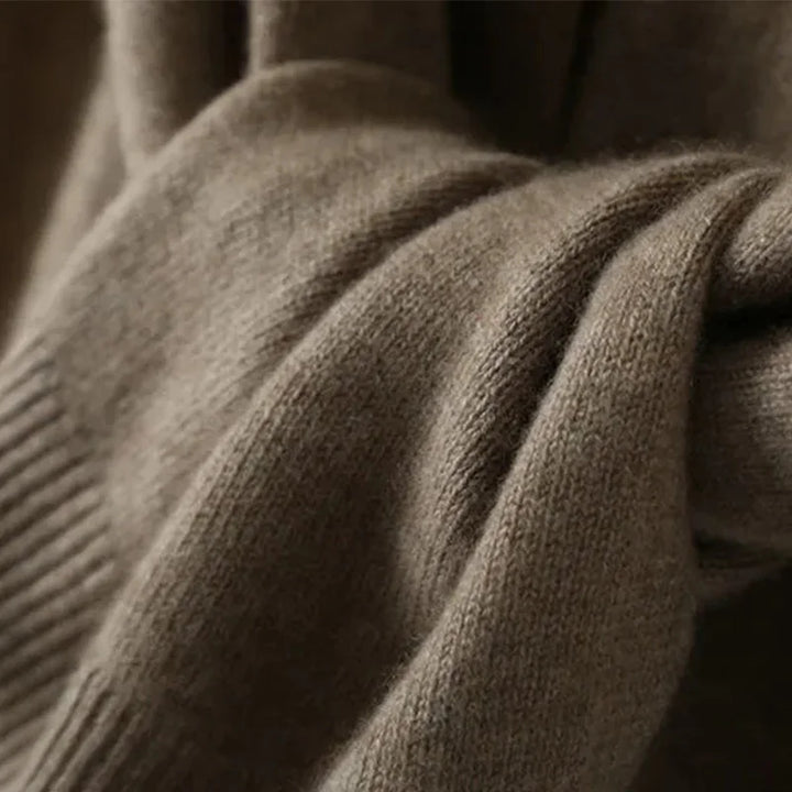 Soft polyester knitted cape wrap for women in beige, a chic and cozy addition to any wardrobe.