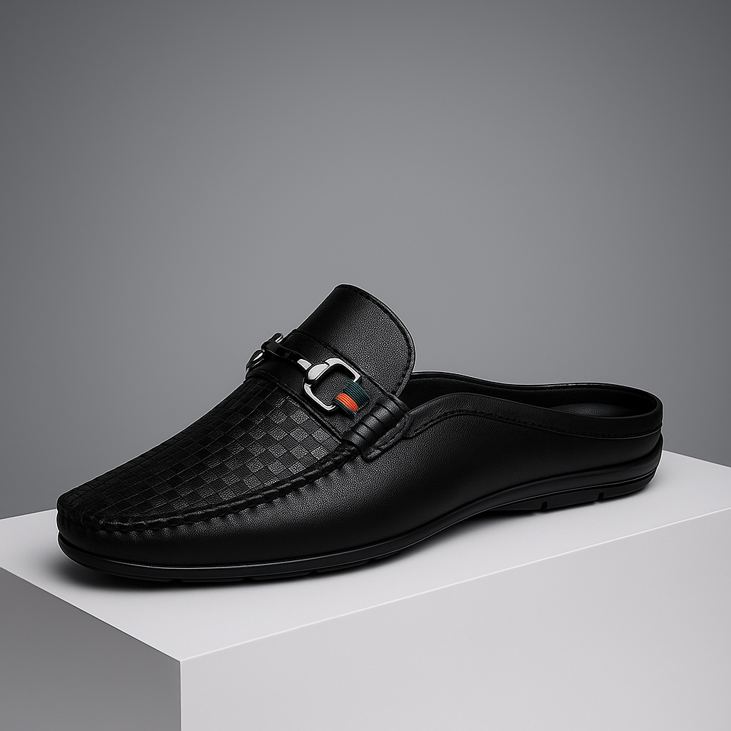 White perforated leather mules for women with a stylish metal bit, offering comfort and breathability.