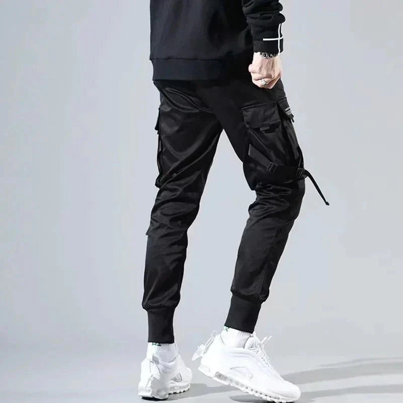 Trendy men's black multi-pocket cargo pants for hip-hop fashion, streetwear, and everyday comfort.
