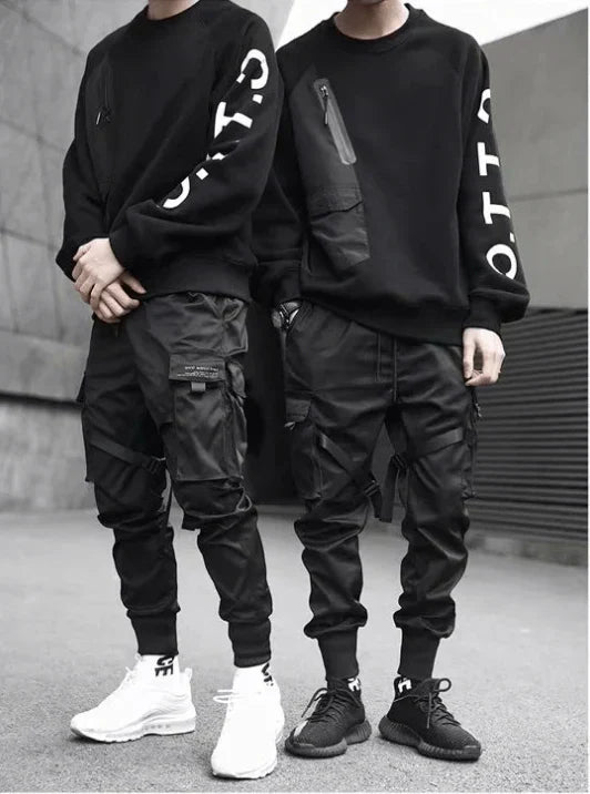 Stylish men's black multi-pocket cargo pants for urban fashion, hip-hop streetwear, and comfort.