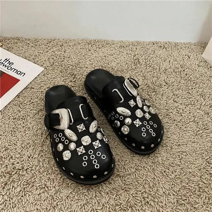 Chic black platform sandals for women, featuring edgy studded straps & a comfortable high sole.