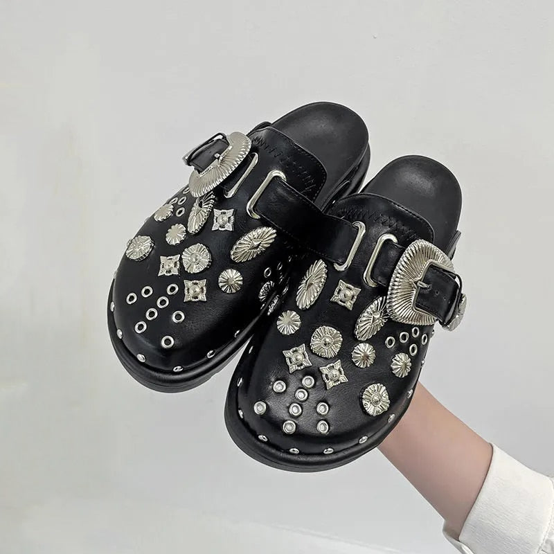 Women's bold black studded platform sandals, ideal for parties, casual outings, & statement fashion.