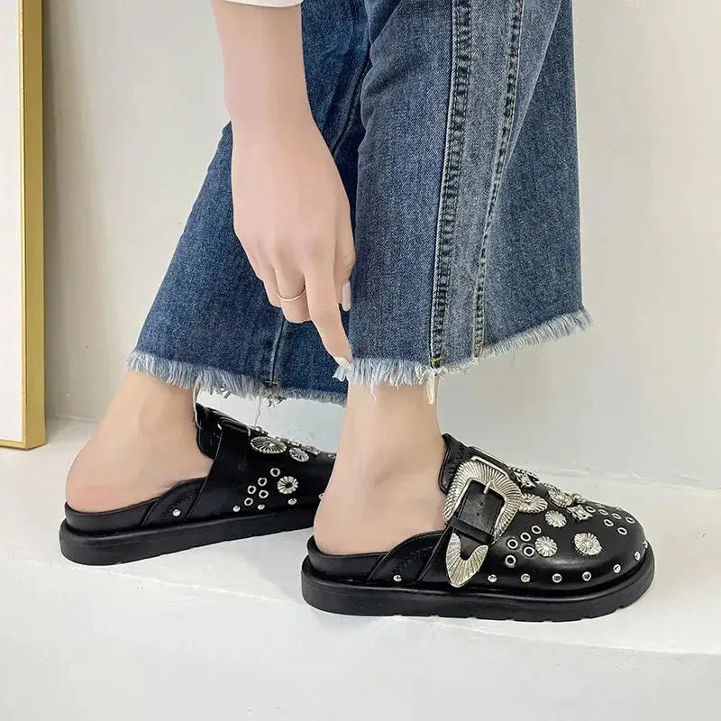 Comfortable & edgy women's black studded platform sandals, perfect for making a fashion statement.