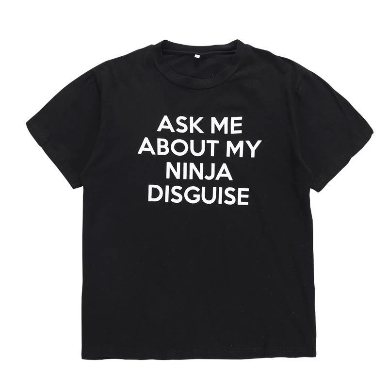 Novelty unisex black t-shirt featuring a playful flip-up ninja graphic, perfect for humor.