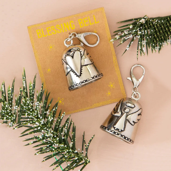 Spiritual Blessing Bell Charm featuring a detailed flower motif, bringing luck & safeguarding