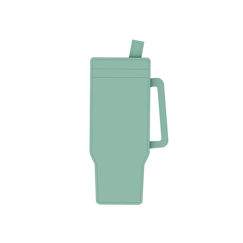 Angled view of a full silicone cylinder ice cube tray with its lid securely on.