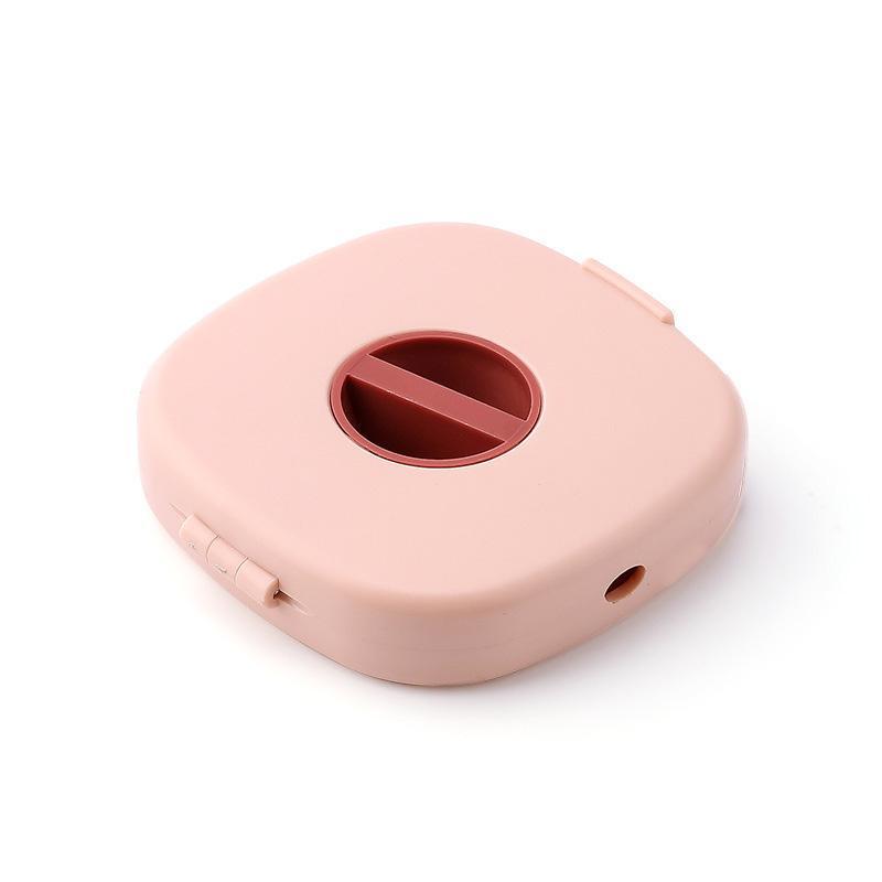 Packaging for the universal cable winder & phone stand, highlighting its use as a desk/cord organizer.