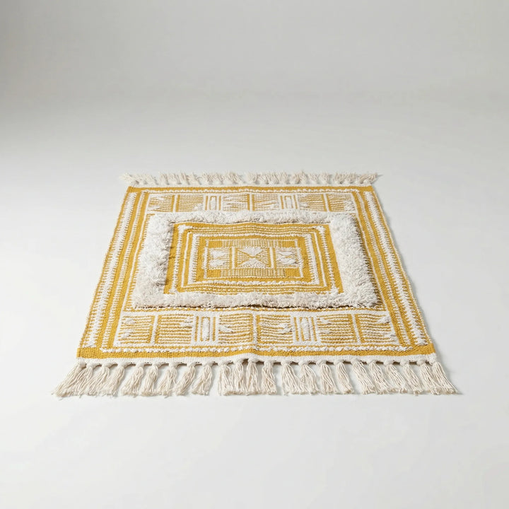 Woven Flowique Statement Area Rug with unique wave design & fringe. Great for bohemian living room or bedroom.