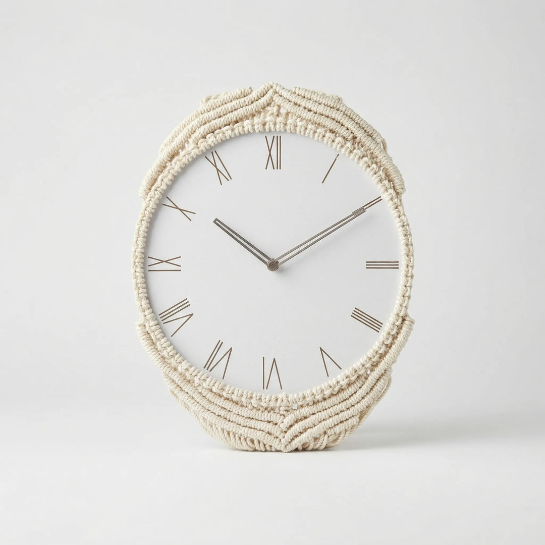 Close-up of a bohemian wall clock, showcasing detailed macrame work and the analog clock face.