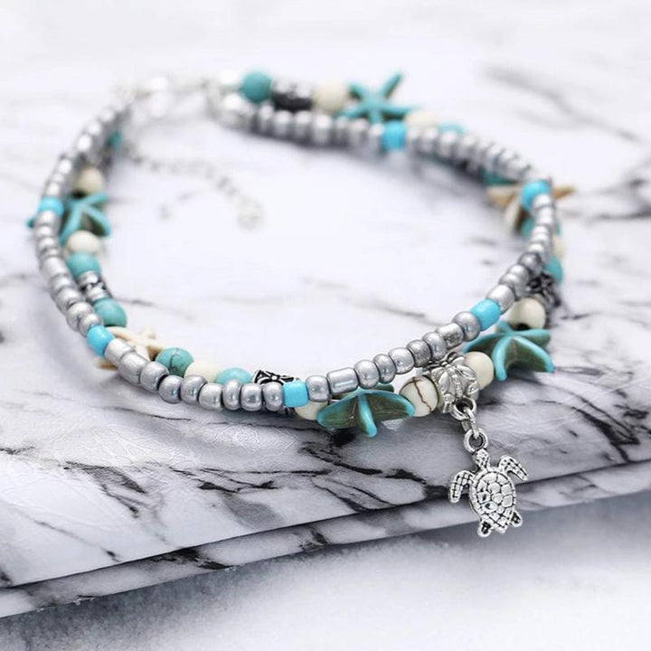 Elegant bohemian sea turtle anklet, a charming accessory for any woman's summer jewelry collection.