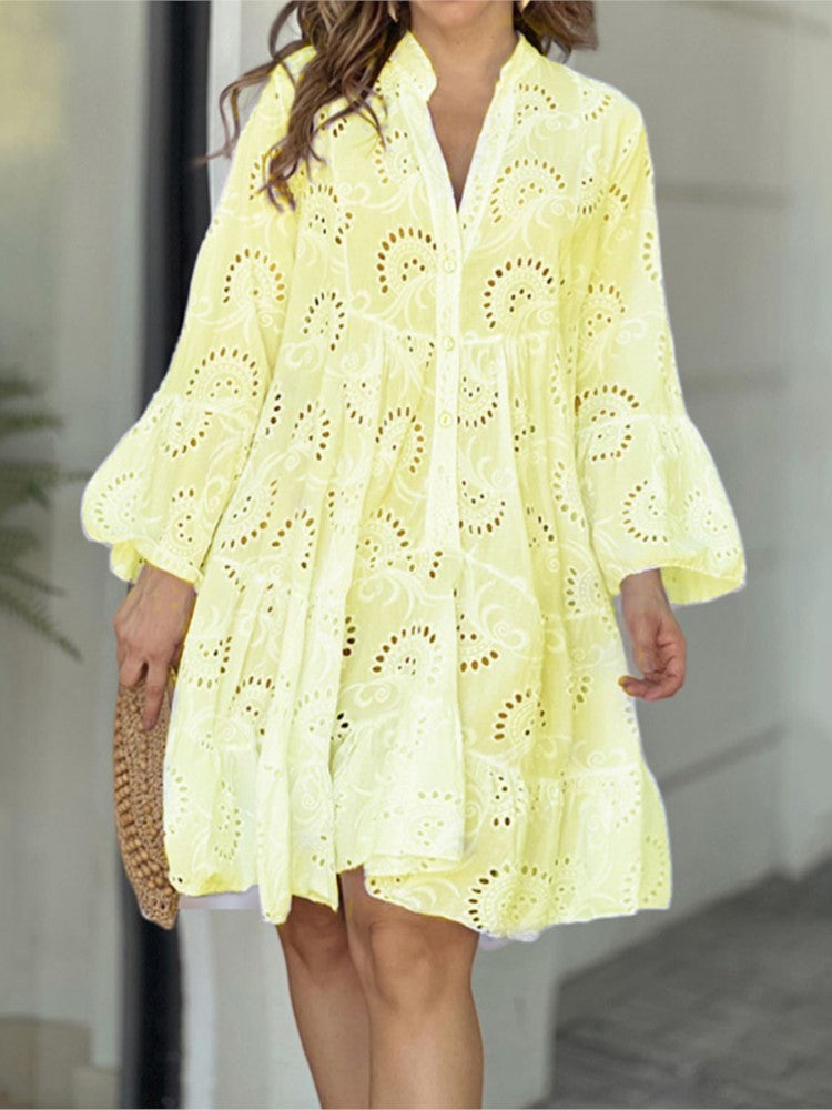 Stylish women's embroidered tiered mini dress. V-neck, bell sleeves, A-line shape. Perfect casual summer party dress.