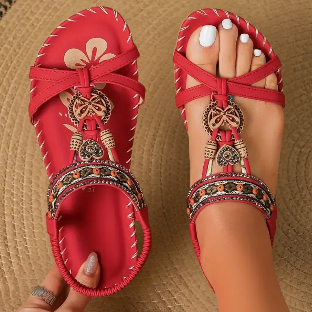 Women's stylish boho flat t-strap sandals with orthopedic support, perfect for casual summer fashion.