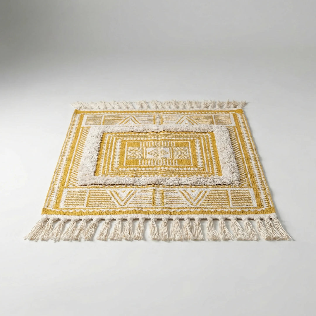 Flowique Boho geometric area rug with fringe. Neutral, soft texture for stylish home decor in any room.