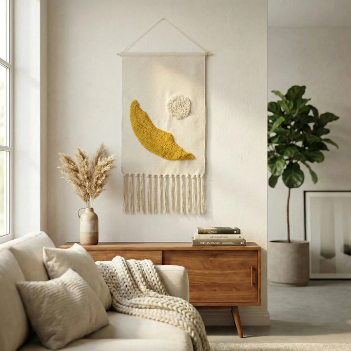 Elegant boho wall tapestry with distinct geometric patterns, textured waves & long decorative fringe.