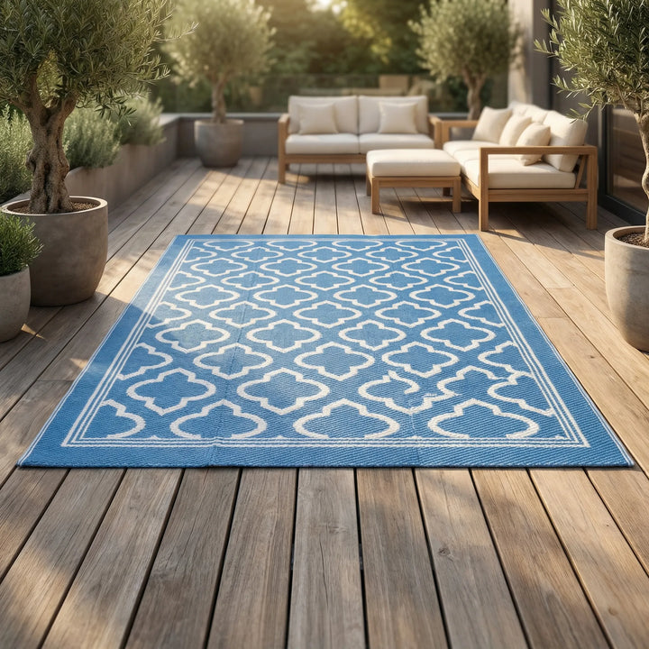 Weather-resistant boho-style outdoor deck rug with a unique wave design. Durable and easy to maintain.