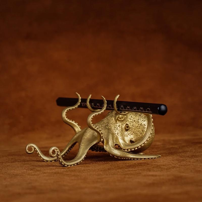 Brass octopus phone stand, unique desktop decor & novelty office accessory