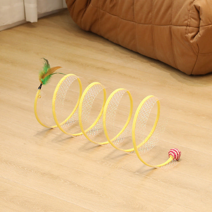 Close-up of a cat's paw reaching for a feather toy inside an interactive play tunnel.