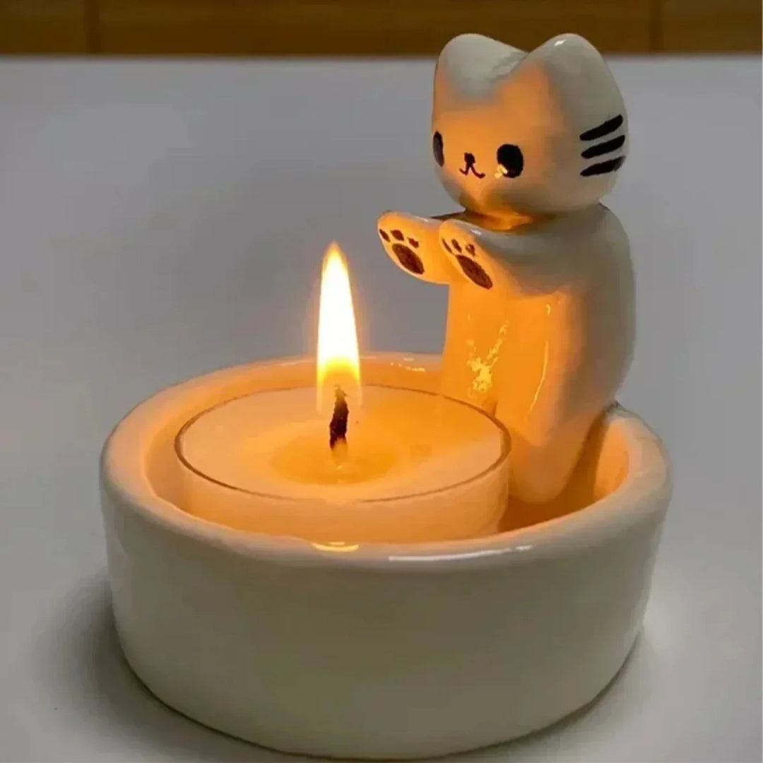 Charming cat figurine candle holder in detailed gypsum, perfect feline home accent for desktop decor