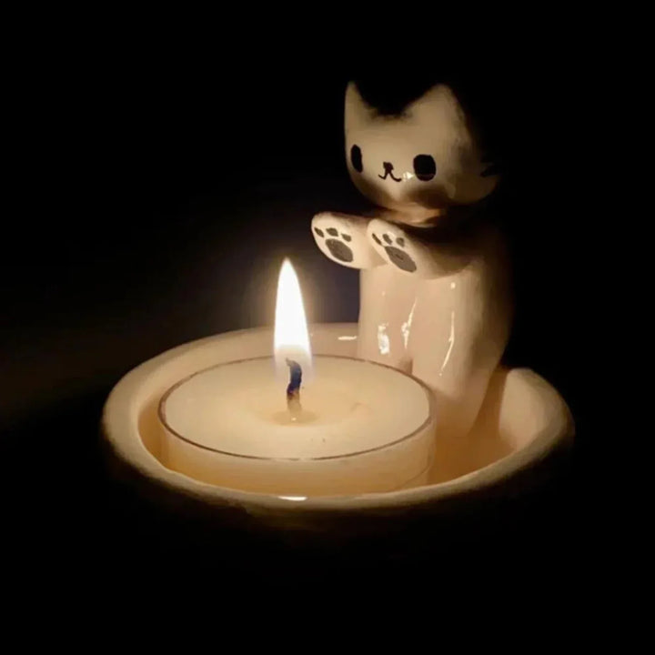 Close-up of a whimsical cat candle holder, a gypsum animal figurine tabletop decoration