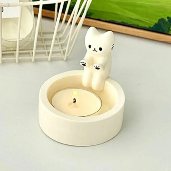 Adorable feline candle holder, a unique gypsum figurine bringing charm to any home accent display