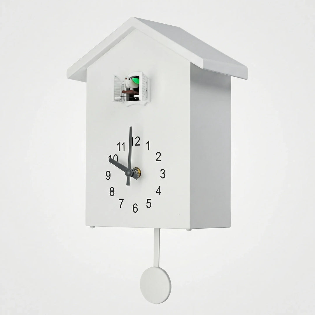 House-shaped cuckoo wall clock with a charming design, a quiet and decorative timepiece.