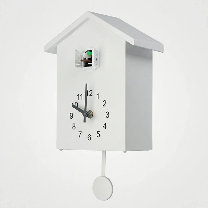 House-shaped cuckoo wall clock with a charming design, a quiet and decorative timepiece.