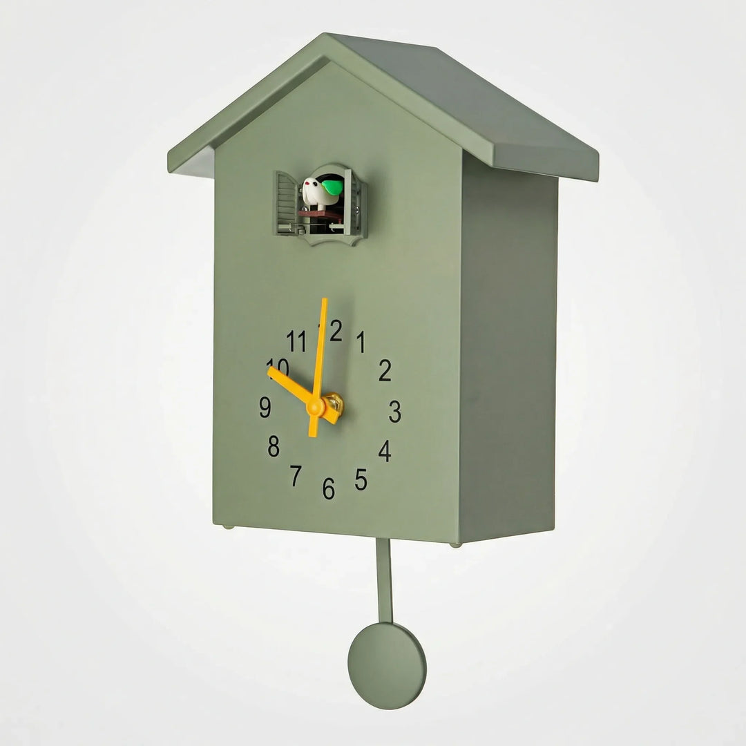 Decorative cuckoo wall clock, modern, unisex, charming home decor timepiece for any room.