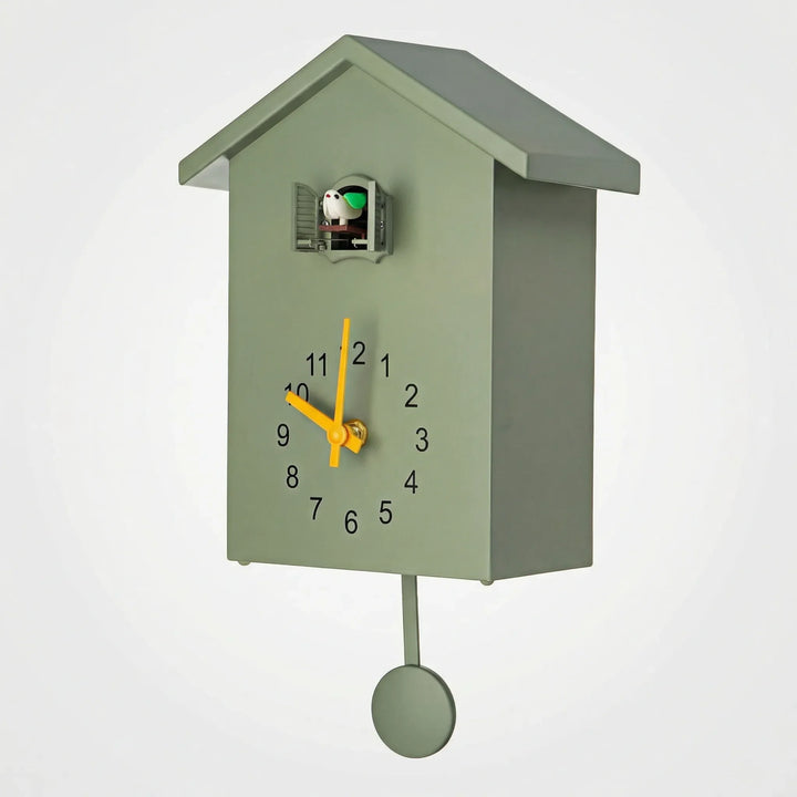 Decorative cuckoo wall clock, modern, unisex, charming home decor timepiece for any room.