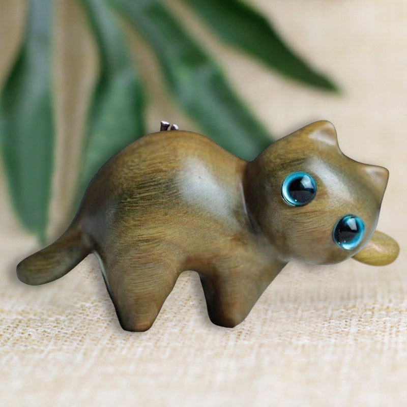 Finely crafted wooden cat, a charming animal sculpture for any room