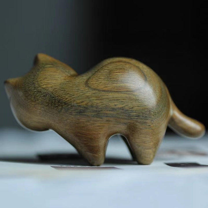 Handmade wooden cat ornament, showcasing natural wood grain, ideal for home decor