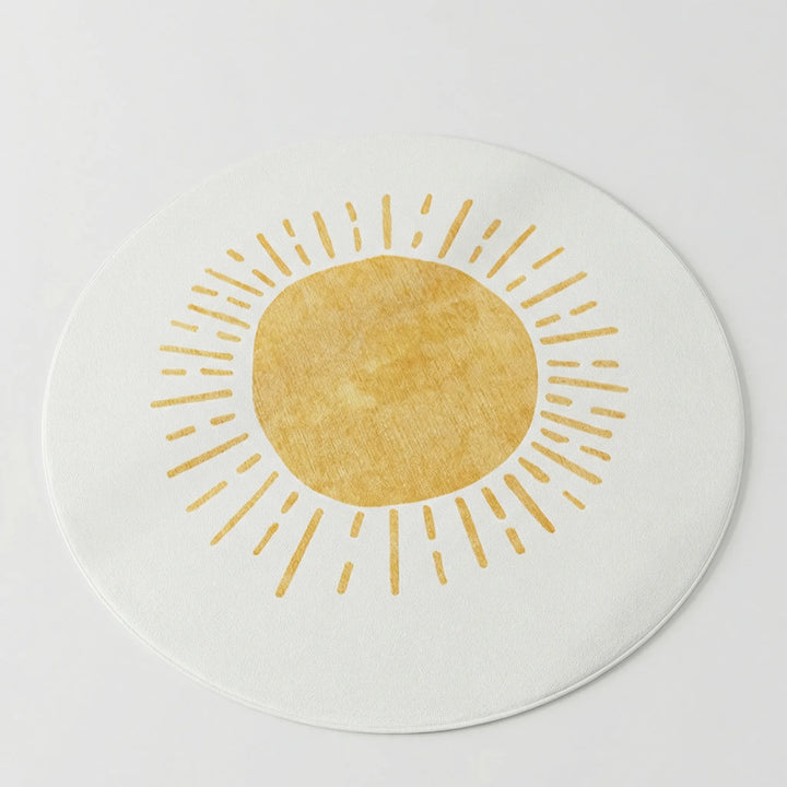 Statement round sun motif area rug with wave pattern, Flowique. Adds charming and cozy flair to home decor.