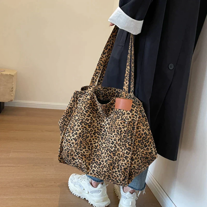 Designer quality women's leopard print shoulder bag. Stylish animal print everyday handbag for women.