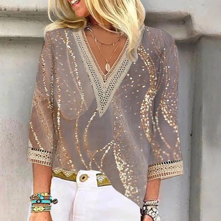 Elegant green V-neck summer blouse. Women's relaxed fit top, ideal for casual wear with a chic, comfortable feel.